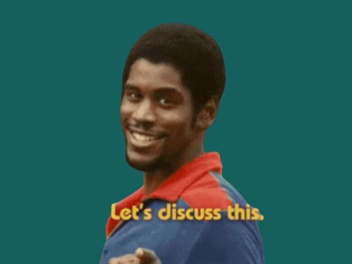 man pointing at camera with text let's discuss this and a green background